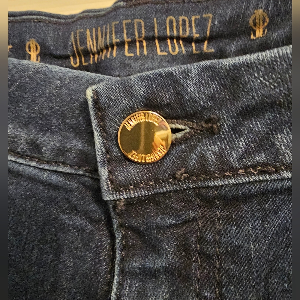 Jennifer Lopez bootcut jeans. Size 16 dark wash with gold accents.